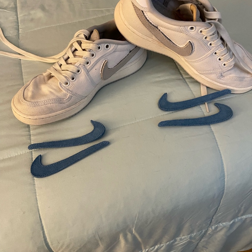 Nike White Sneakers with Interchangeable Swooshes